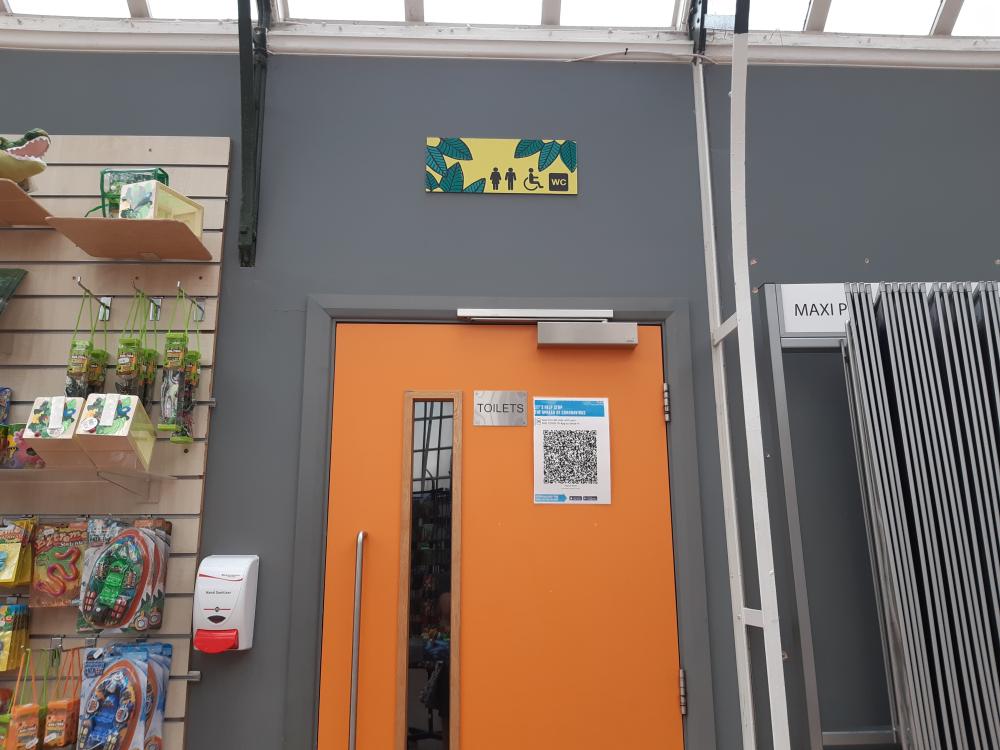 Orange door leading to toilets